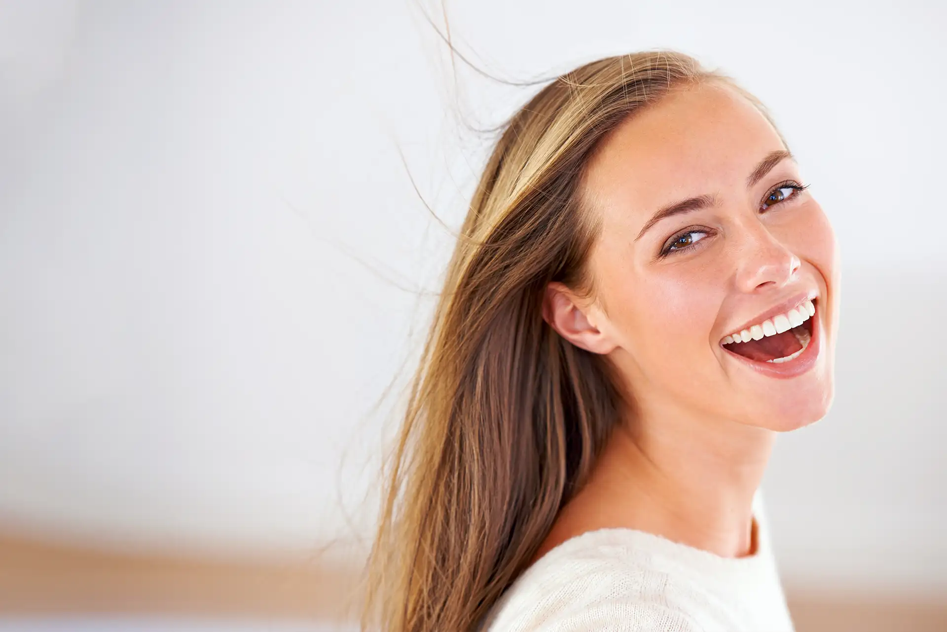 A happy woman with a perfect smile