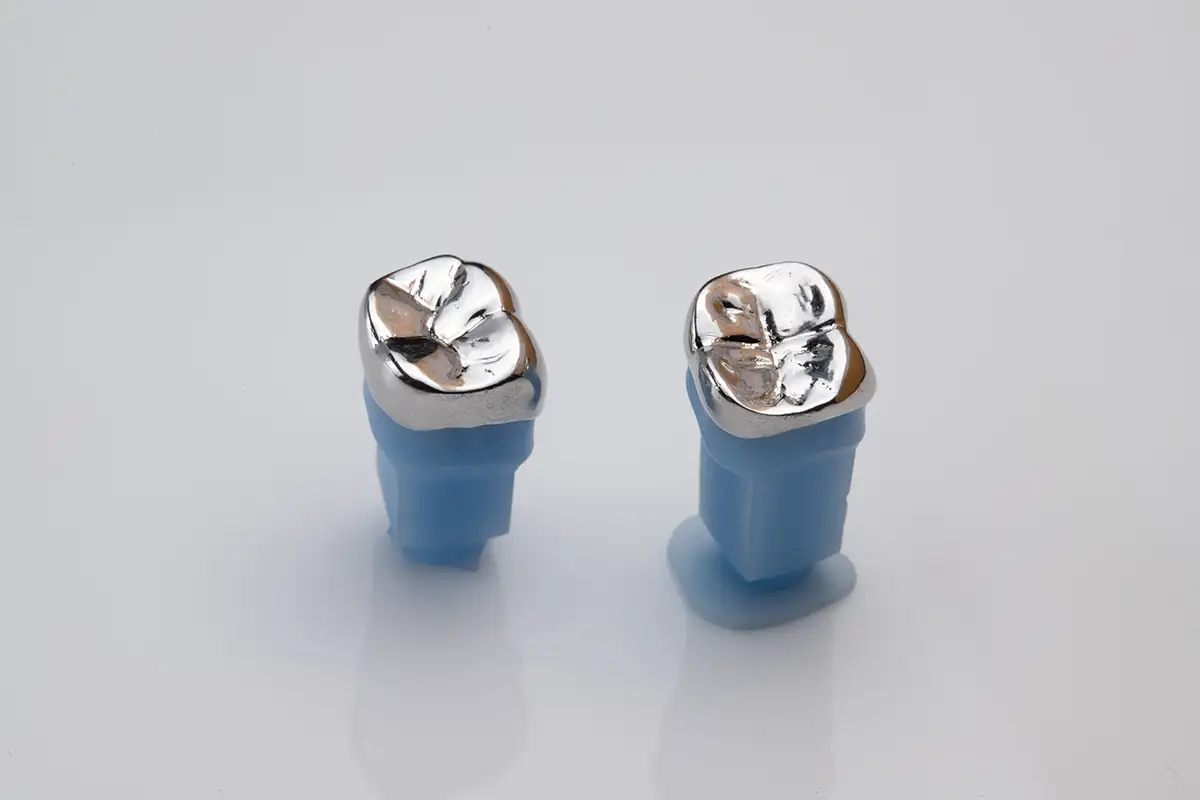 A pair of metal crowns